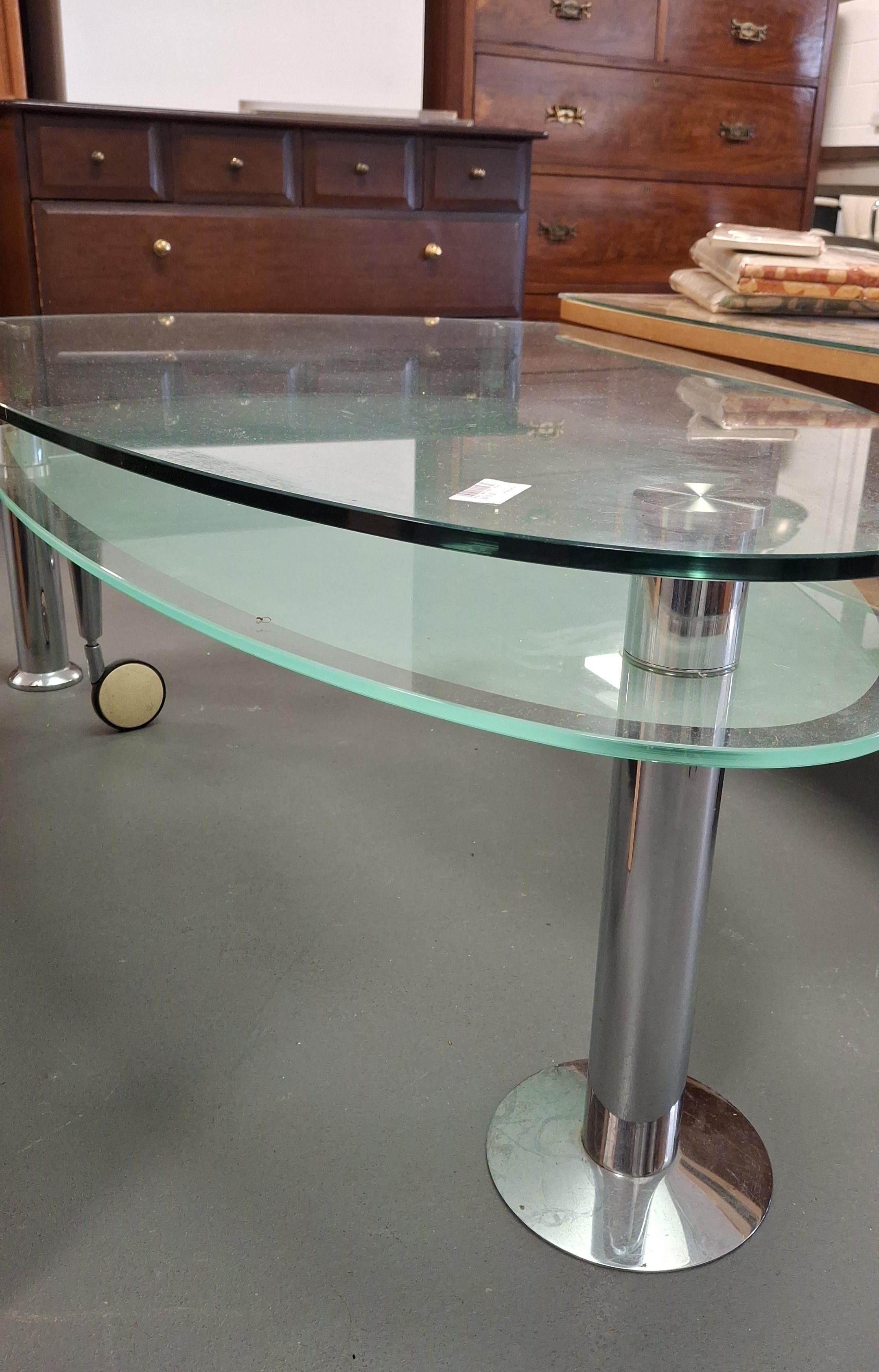 Glass swivel table
