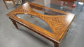 Solid wood coffee table with glass inserts