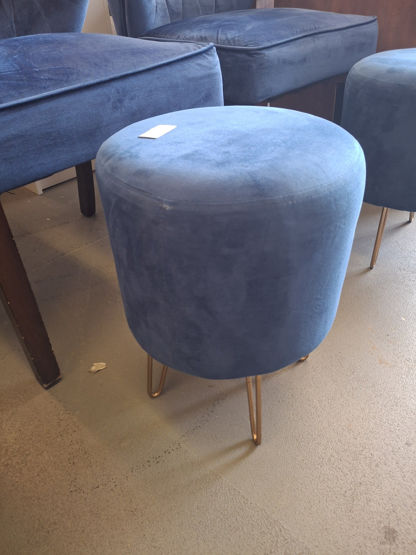 Royal blue velvet chairs and stools