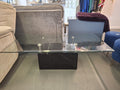 Glass top table with marble base
